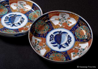 Two Signed Antique Imari Fuchi-daka Plates