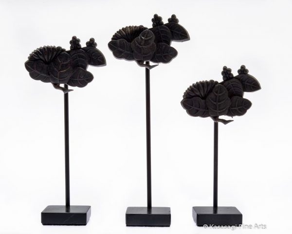 Three Kugikakushi Decorative Nail Covers on Custom Stands