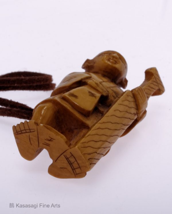 Stag Horn Netsuke Merchant With Staff