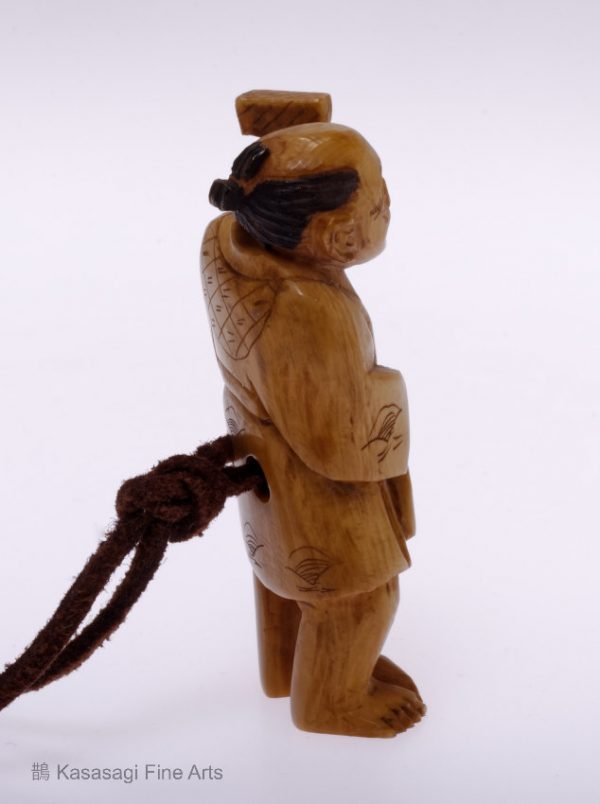 Stag Horn Netsuke Merchant With Staff